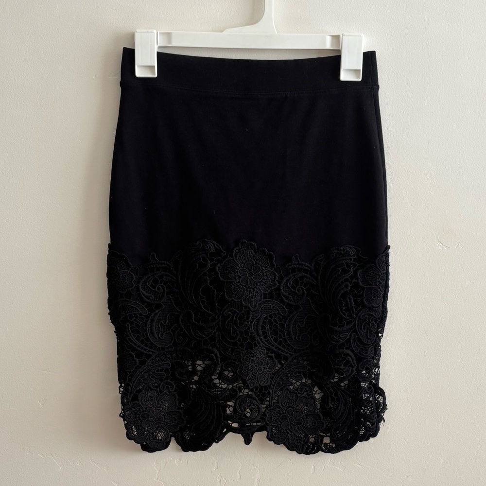 Black lace mini skirt